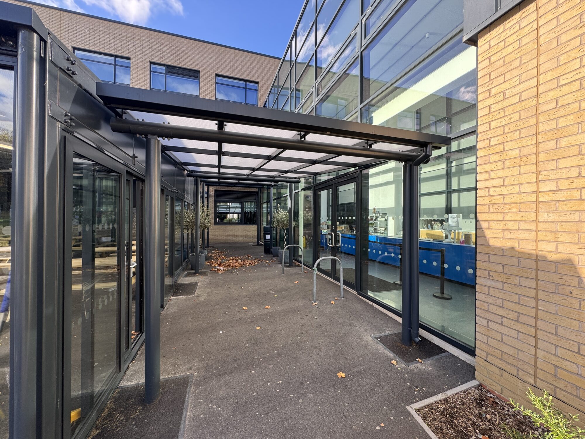 Mono-pitched roof entrance canopy